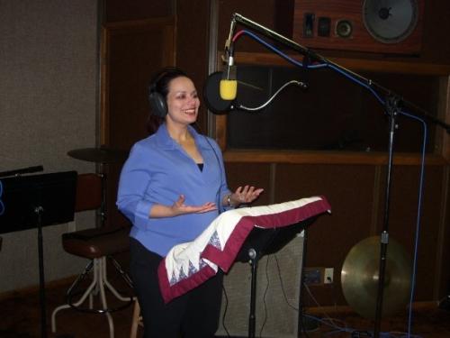Voice talent, emilia Candelaria, doing audio recording of Poems of Inspiration: A Daily Dose of Self-Motivation